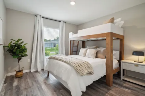 Bedroom 2 with queen bed and twin bunk