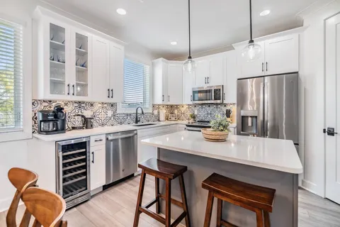 Kitchen with coffee maker and wine fridge